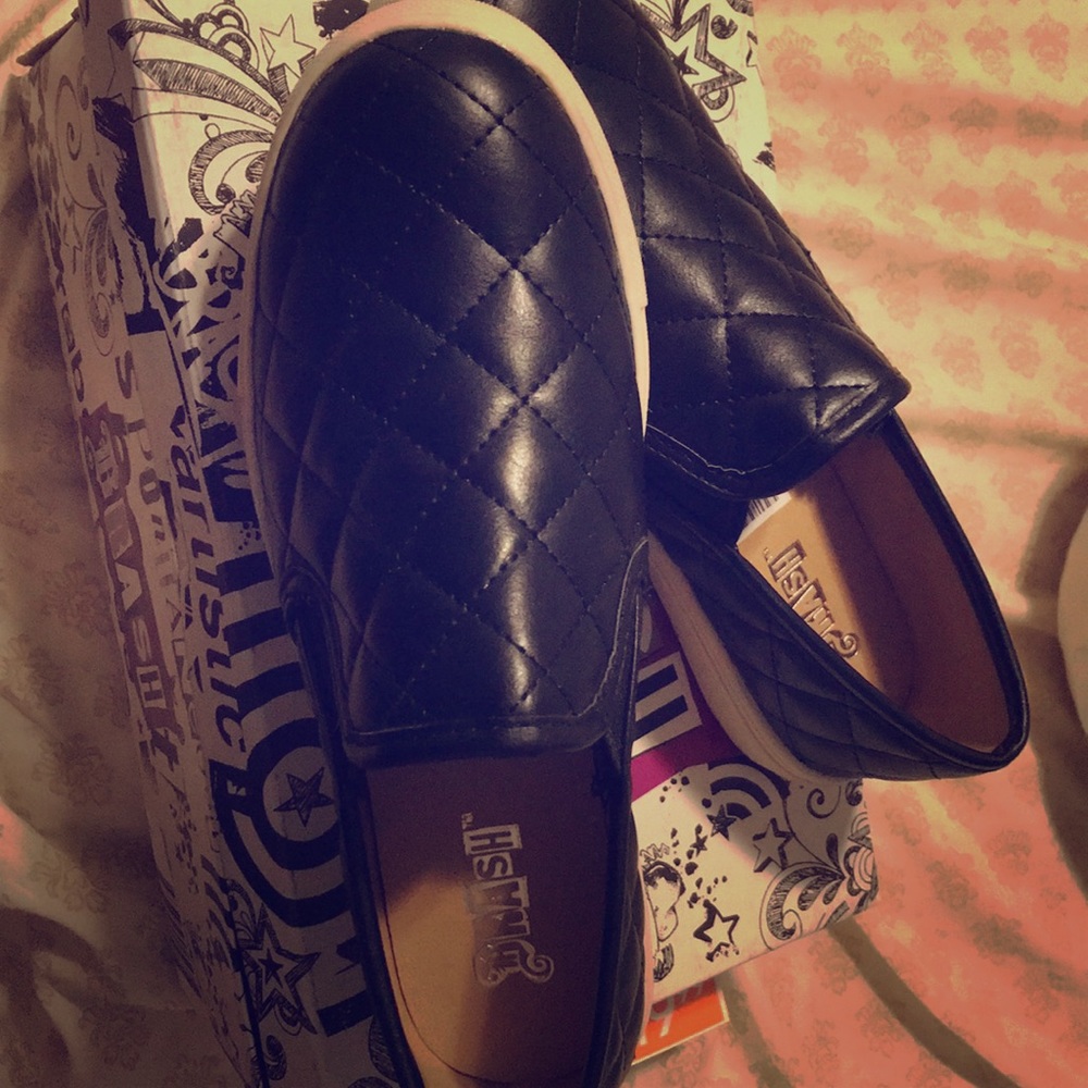 Black quilt patterned slip on shoes